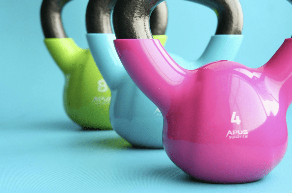 Using exercise to manage stress. Photo of weights.