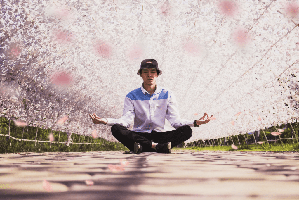 Man meditating to manage stress