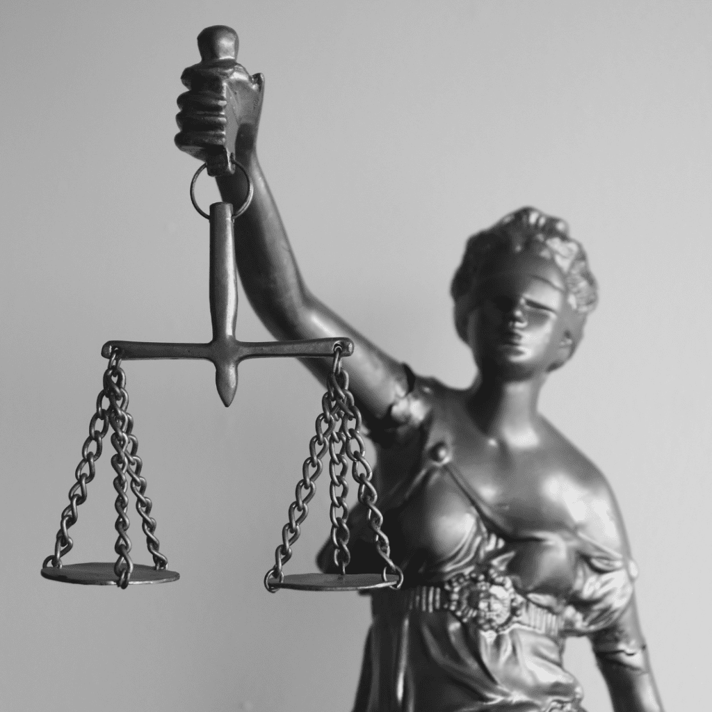 Statue of woman holding a balance 