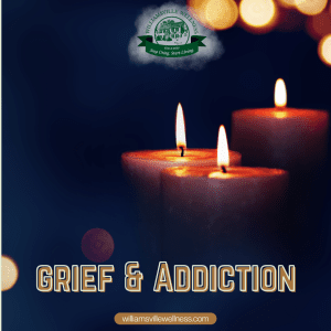 Photo of candles lit in the background with the text "Grief & Addiction" overlaid on top.